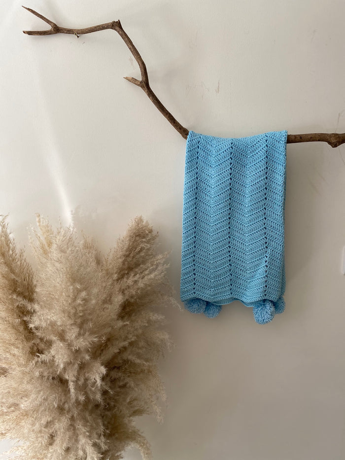 Pram blanket with pom poms - skye blue, organic cotton